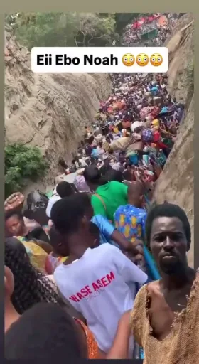 A video of a crowd of people trying to move forward. The video is signed 'Eii Ebo Noah' and has Ebo Noah's image on it.